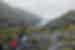 Travellers and leader hiking toward Exit Glacier in the mountains near Seward Alaska