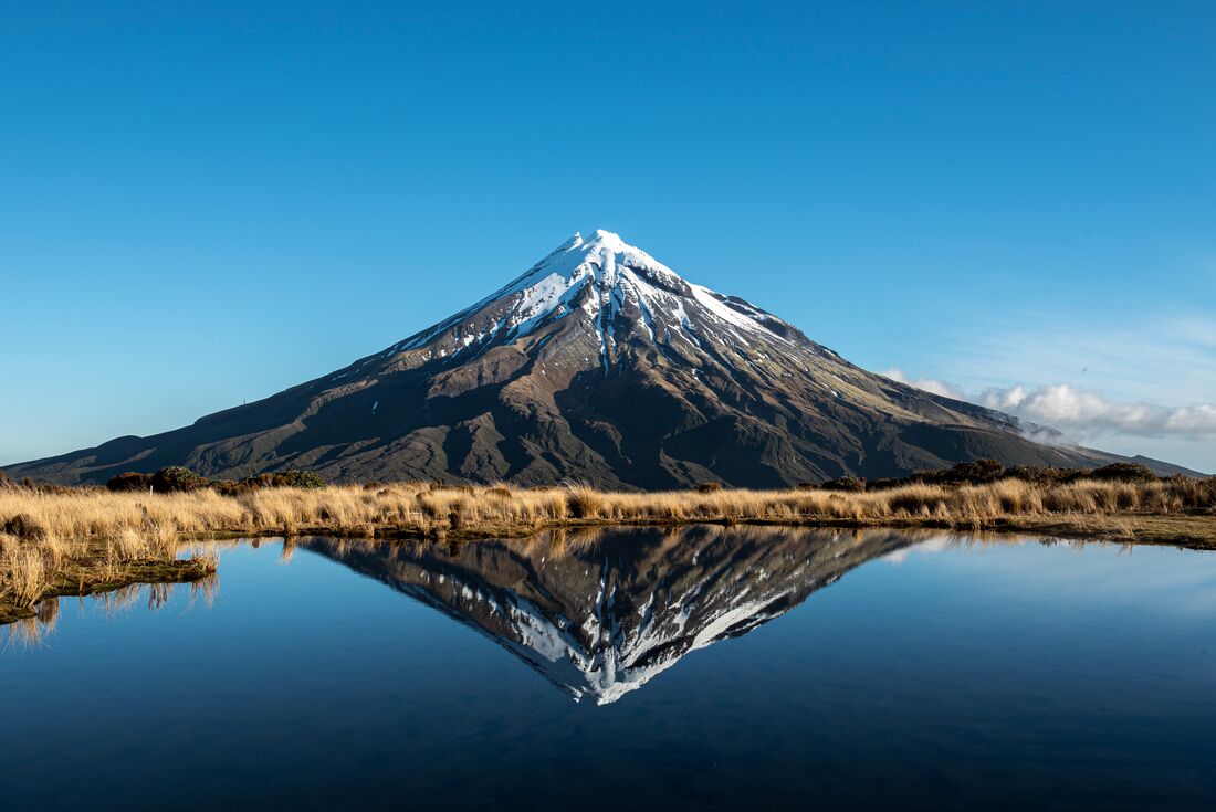 Mount Taranaki being refelcted in Pouakai Tarn, New Zealand
