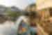 Photo from traveller perspective standing in a canoe looking at stilted village of Ganvie submerged in water