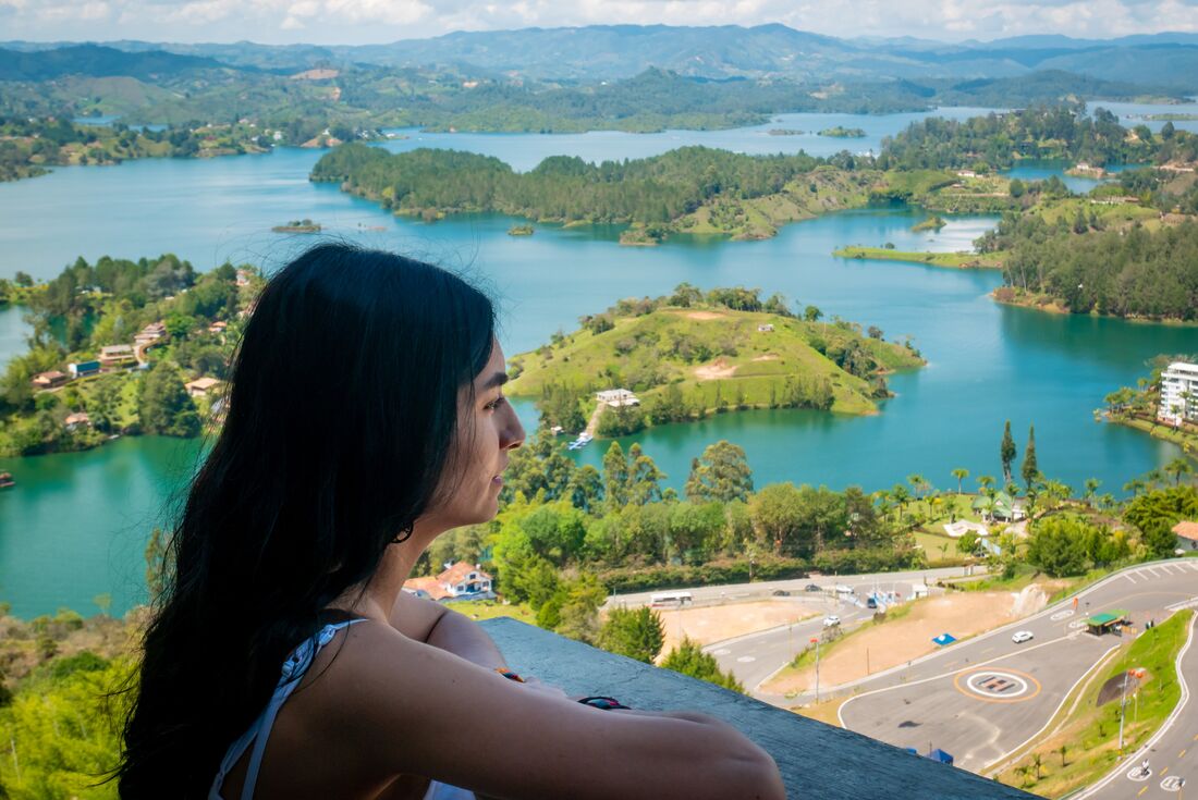 Traveller enjoying the view of reservoir in Guatape, Colombia