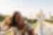 Woman smiling in front of the Taj Mahal on an Intrepid Travel tour of Agra, India.