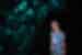 Glow worms embedded in Ruakuri cave walls light up for an Intrepid traveller