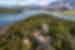 Aerial view of Butrint National Park, Albania, showing a castle, greenery and the lake