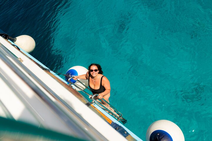 Woman smiling by boat