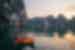 Travellers kayak on Halong bay in Vietnam