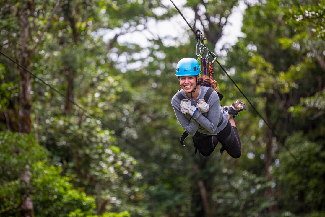 Traveller enjoying a zipline ride in Mounteverde, Costa Rica