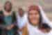 Local women in traditional dress smile for camera in Gilgit