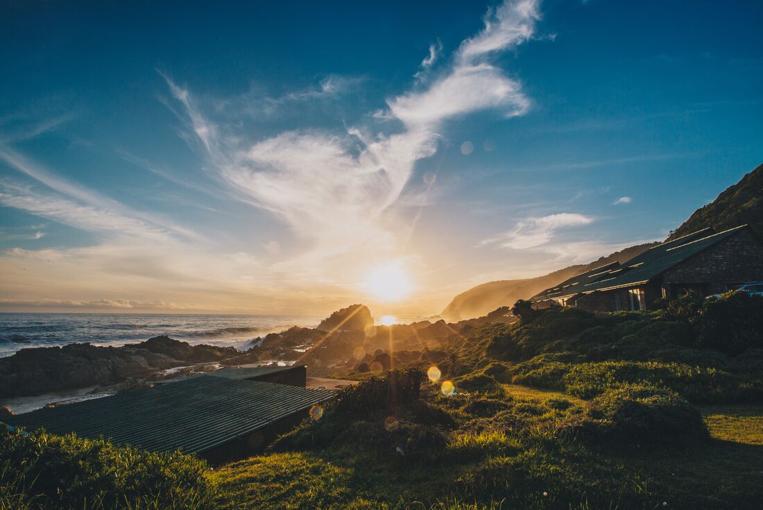 Garden Route National Park coast in South Africa with the sunset hitting the camera 