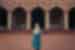 Intrepid traveller stands in awe in the coutyard of the Jama Masjid mosque in Delhi, India