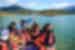 Group enjoying ride down the Lapataia River in inflatable boat, Tierra del Fuego, Argentina