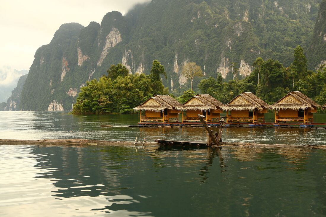 Rafthouses and mountain scenery in Khao Sok, Thailand