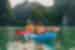 Intrepid travellers pause to take in the majesty of Ha Long Bay while kayaking