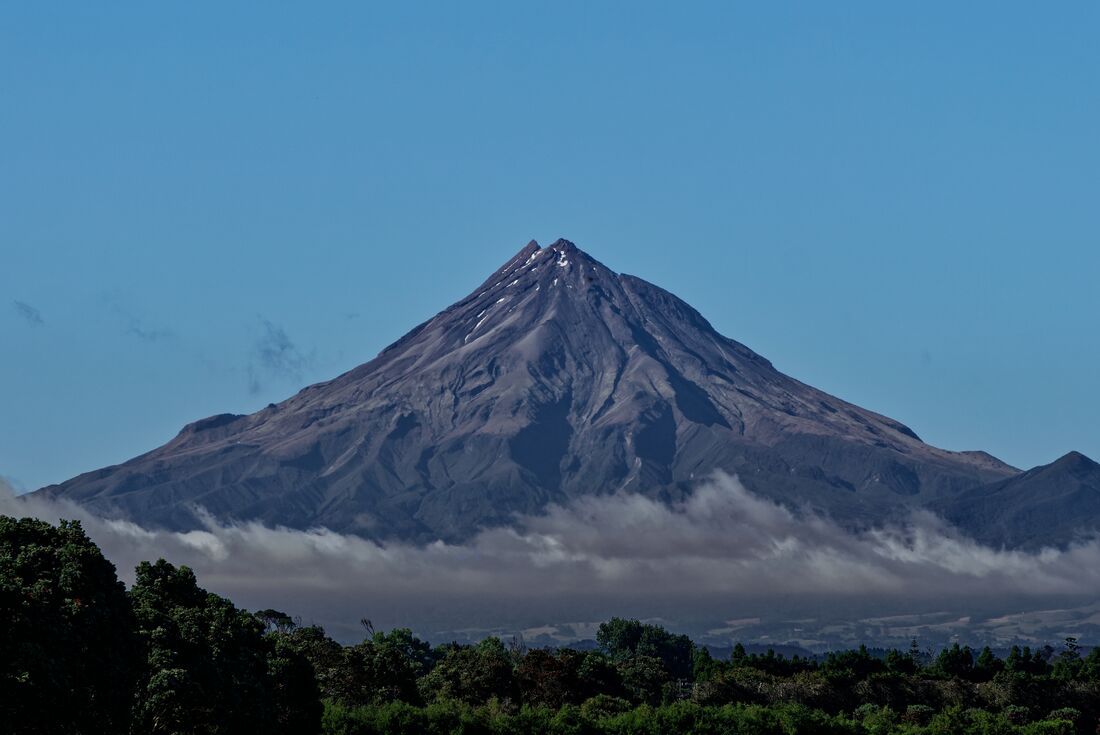 Mount Taranaki with mist below, New Zealand