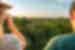 Intrepid travellers look out at the Amazon Rainforest at sunset in Puerto Maldonado