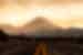 Low shot from the road of sunrise behind Mount Ngauruhoe in Tongariro National Park
