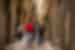 A tour leader shows travellers the streets of Barcelona, Spain.