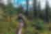 Travellers smile with joy while hiking on a board trail in Denali National Park in Alaska