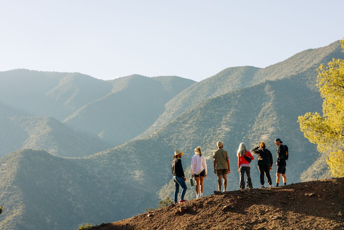 Travellers enjoying the view of the landscape in Ouirgane, Morocco