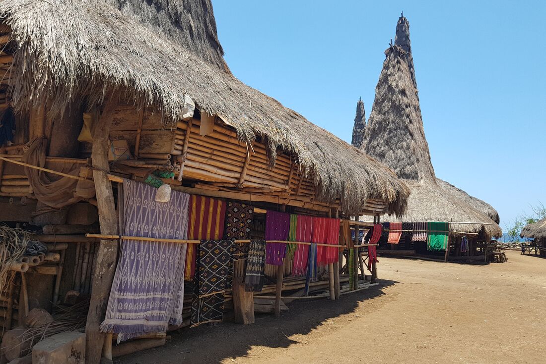 Traditional homes with thatched roofing in Rattenggaro Village, Indonesia
