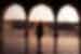 Traveller stands in the archways of mosque in Lahore