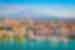 View of the harbour in Catania with Mt Etna in the background, Sicily, Italy