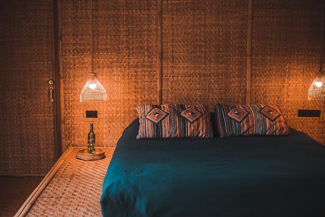Enjoy a cozy night in at Lisu Lodge nestled in the rainforest valley near Chiang Mai