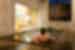 Intrepid traveller relaxes in the natural hot spring waters of an indoor onsen in Yudanaka, in Japan