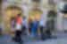 Group congregating out the front of a local store during a bites and sites tour in Paris France