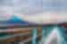 Angular view of Mt. Fuji and Mishima Skywalk bridge across the Japanese landscape in autumn