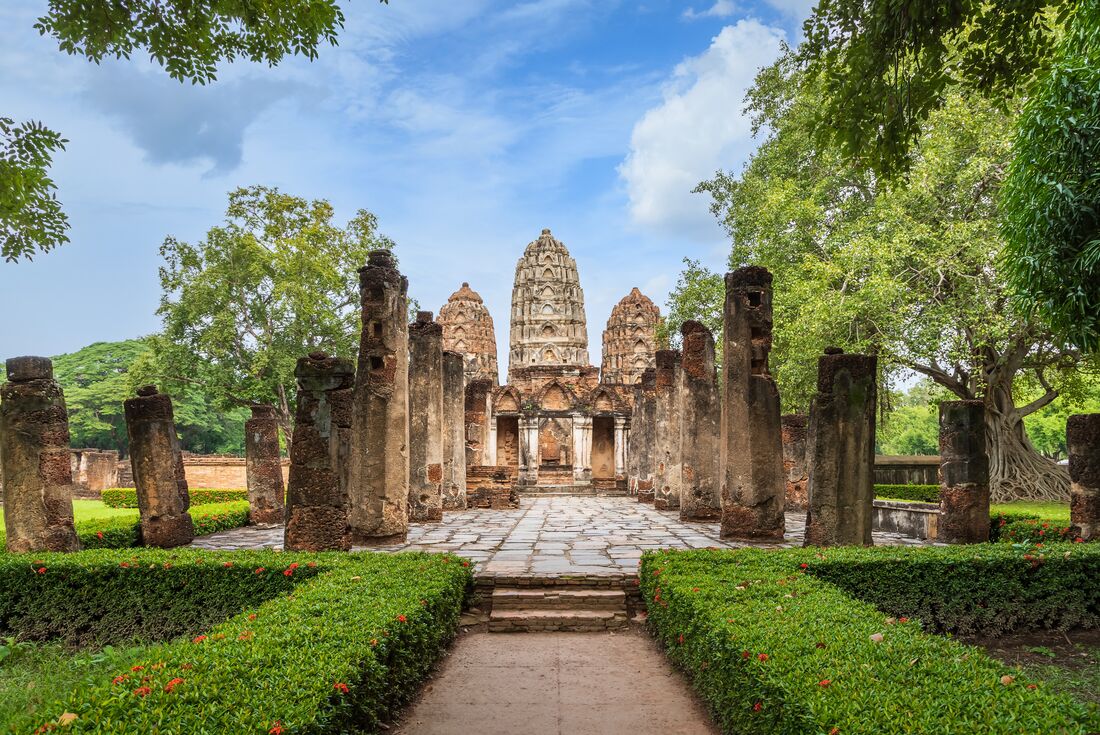 Wat Sri Sawai towers and entrance gate in Sukhothai Historical Park, a temple complex from the 14th century Sukhothai empire