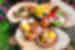 Homemade Romanian food smorgasbord with meats, polenta, breads and wine