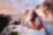 Traveller basks in the glow of the sunset in Santorini in the Cyclades of Greece