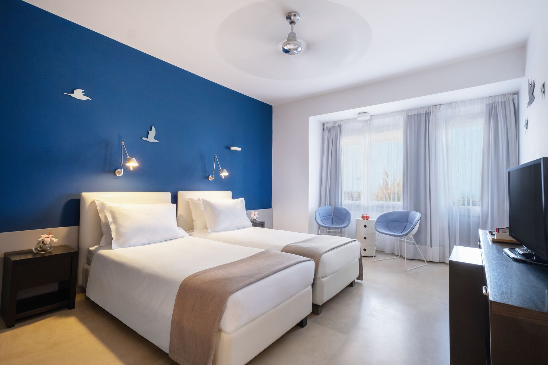 Enjoy a room with a view of the Aegean Sea at Majestic Hotel Santorini