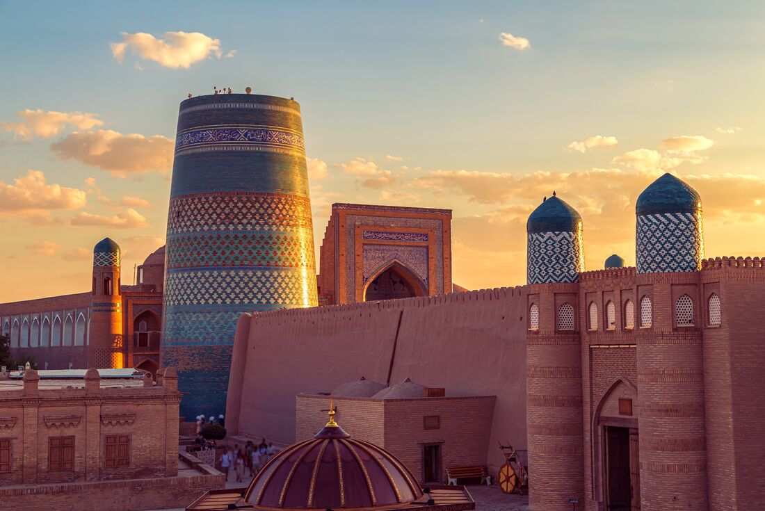 Sunset over Kalta Minor and its minaret in Khiva a UNESCO World Heritage site in Uzbekistan
