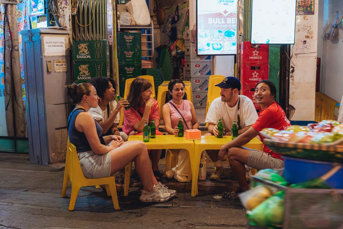 Travellers hanging out having a beer in Hanoi
