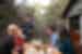 Lunch being served during outdoor group lunch, while travellers sip on wine, Maria Island, Australia