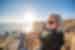 Traveller taking photo of Twelve Apostles, Great Ocean Road, Victoria, Australia