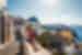 Couple admire view of ocean from high up in Fira on Santorini
