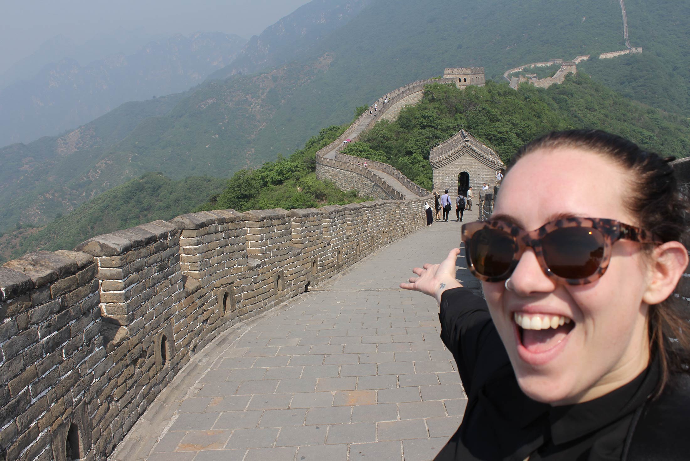 Traveller being enthralled by the expanse of the Great Wall of China