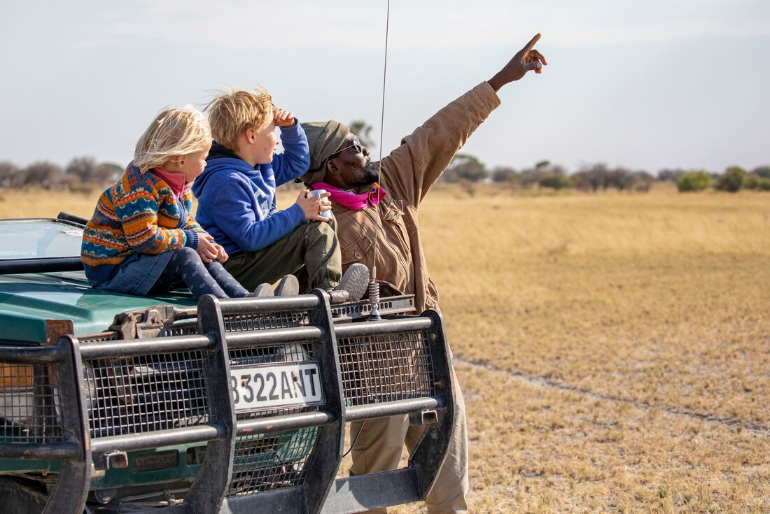 Family fun with leader, Botswana