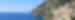 A panoramic of the Amalfi Coast in Italy with land and sea.