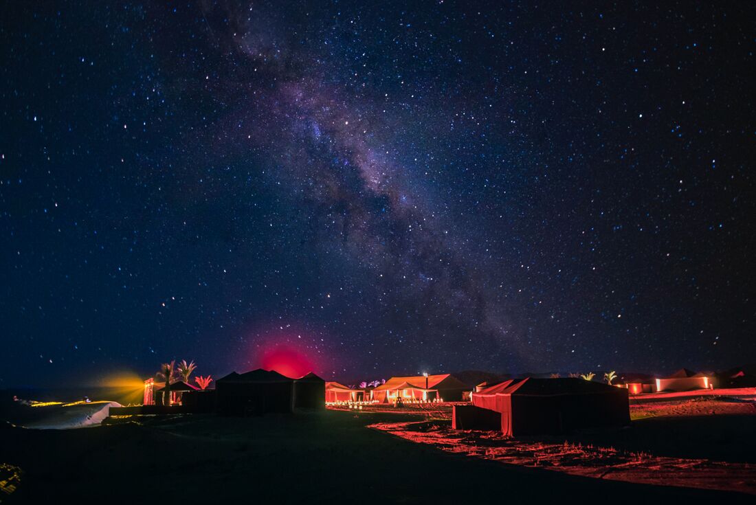 The Milky Way lights up over Lamnaouar Erg Camp in the Sahara