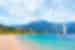 Oludeniz beach in Fethiye with a sailboat anchored offshore