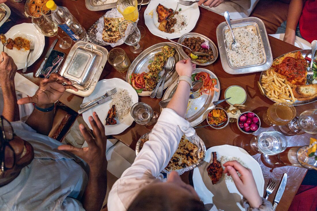 Group dinner spread in Delhi