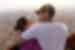 Couple hugging in a balloon ride over Jaipur in India on an Intrepid Travel tour.