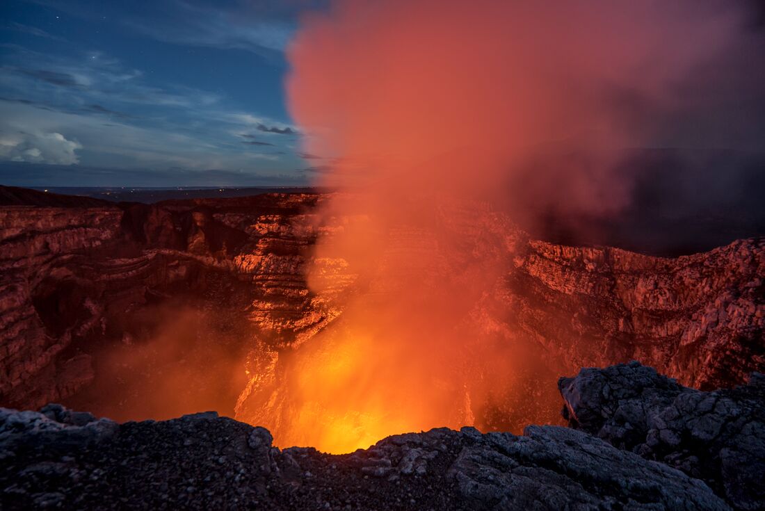 Steam coming out of Masaya Volcano crater, as it emits a twilight glow, Nicaragua