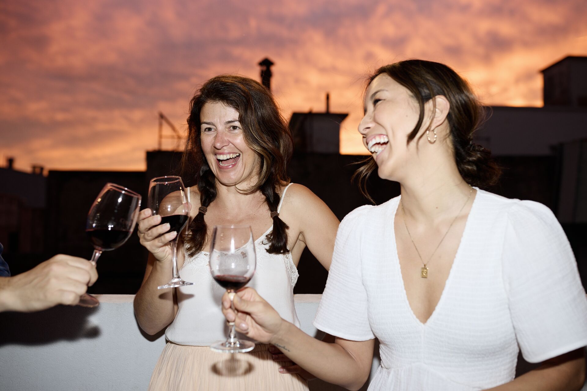 Enjoy a rooftop asado and share a drink with your fellow travellers in Buenos Aires