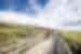 Cycling over a beautiful old bridge on the Otago Central Rail Trail, New Zealand