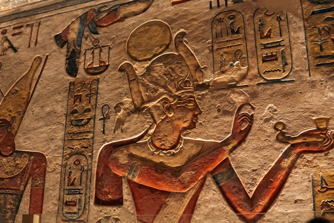 Elaborately painted wall carvings within the tombs of the Valley of the Kings