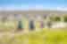 Cycling in beautiful fields on the Otago Central Rail Trail, New Zealand